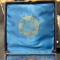 Umberto I (1878-1900): medaglia 1888 a commemorare gli 800 anni della fondazione dell'Università di Bologna, opus Giorgi, 75 mm, grammi 154.93, nella confezione coeva ufficiale con il logo dell'incisore, insieme raro a trovarsi ed in conservazione eccezionale con i fondi speculari, la foto non rende merito