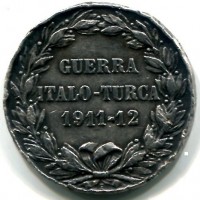 Medaglia, Vittorio Emanuele III "Guerra Italo-Turca", colpi al bordo, 32 mm. Gr. 15,2
