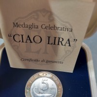 Italia: medaglia in argento "Ciao Lira" anello esterno in argento con al centro un 5 lire. In confezione con certificato
